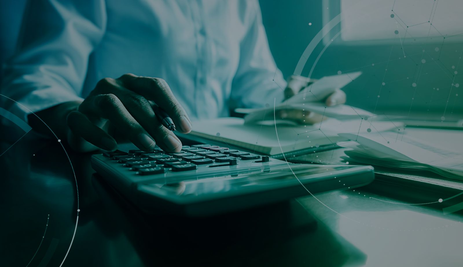 Stock image darkened with an overlay showing a person calculating costs.