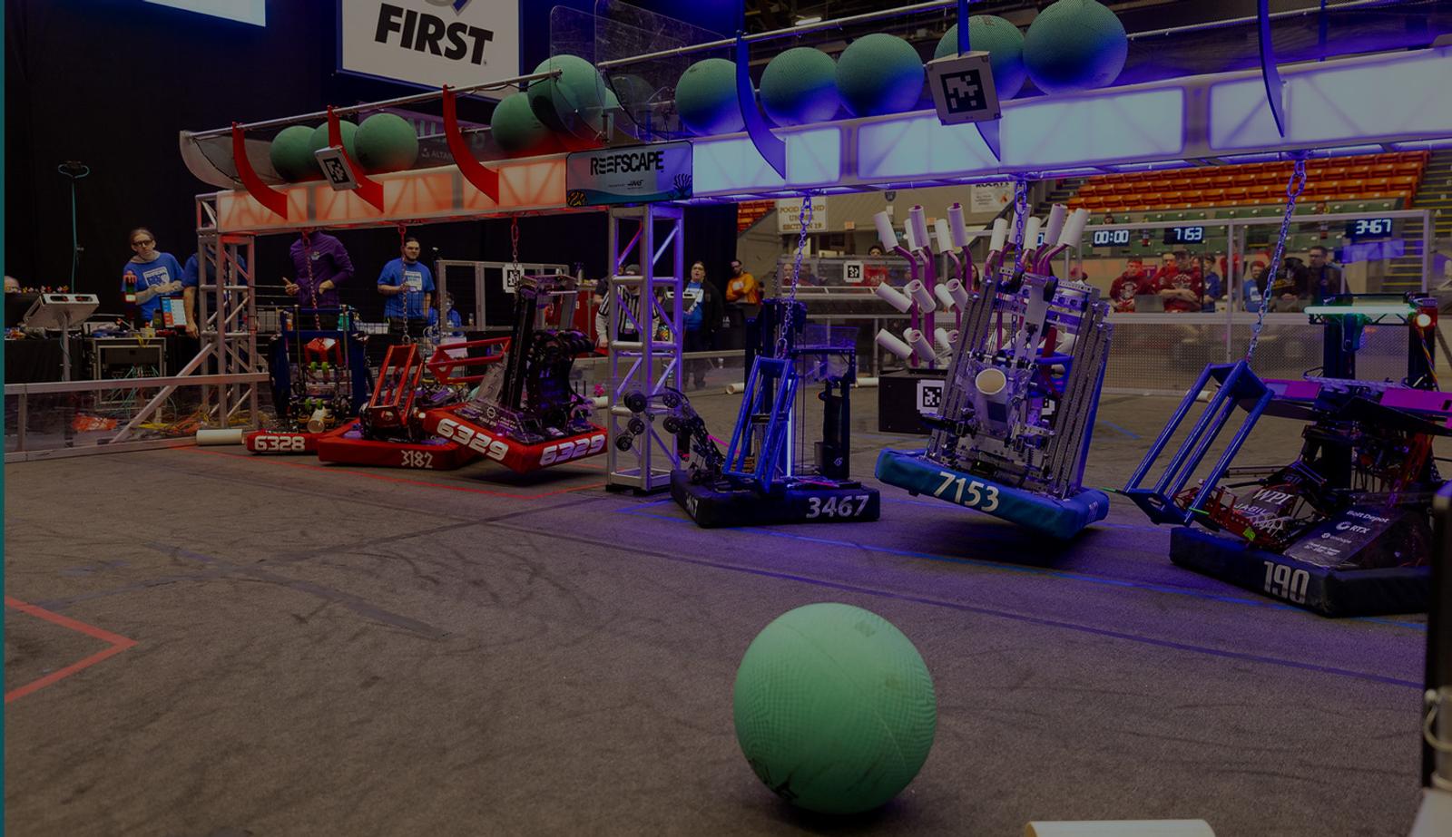 Image with an overlay showing the floor of a FIRST robotics competition. Courtesy: New England FIRST