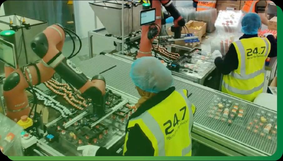 Robotic arms in a factory, designed by DHL