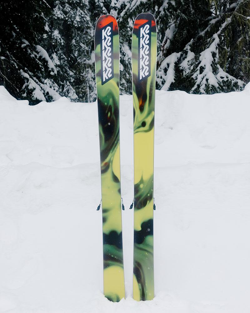 pair of K2 skis stood up in the snow