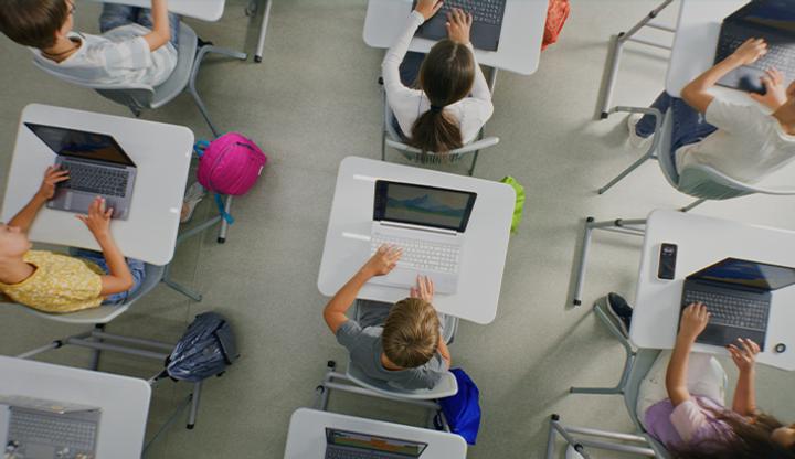 Stock image showing an overhead look at a classroom.