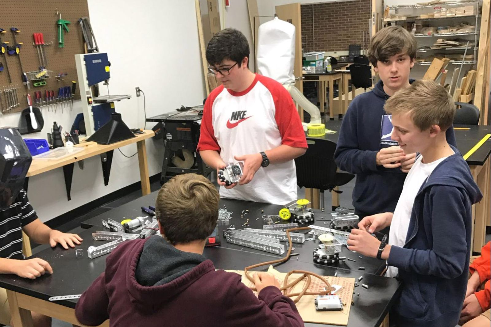 Students testing a robot drivetrain idea.