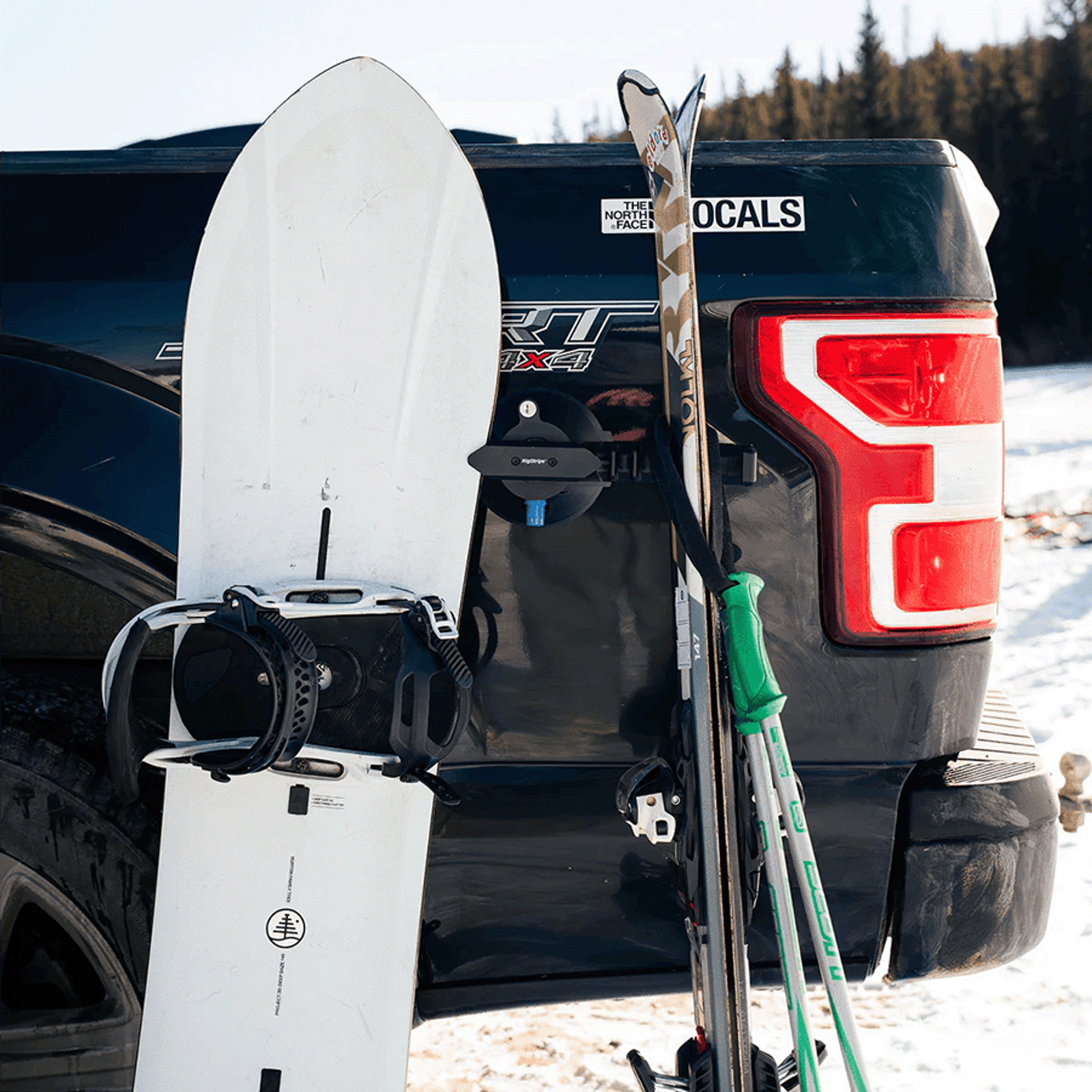 Customer image showing RigStrips SnoStrip attaching snow gear to the bed of a truck.