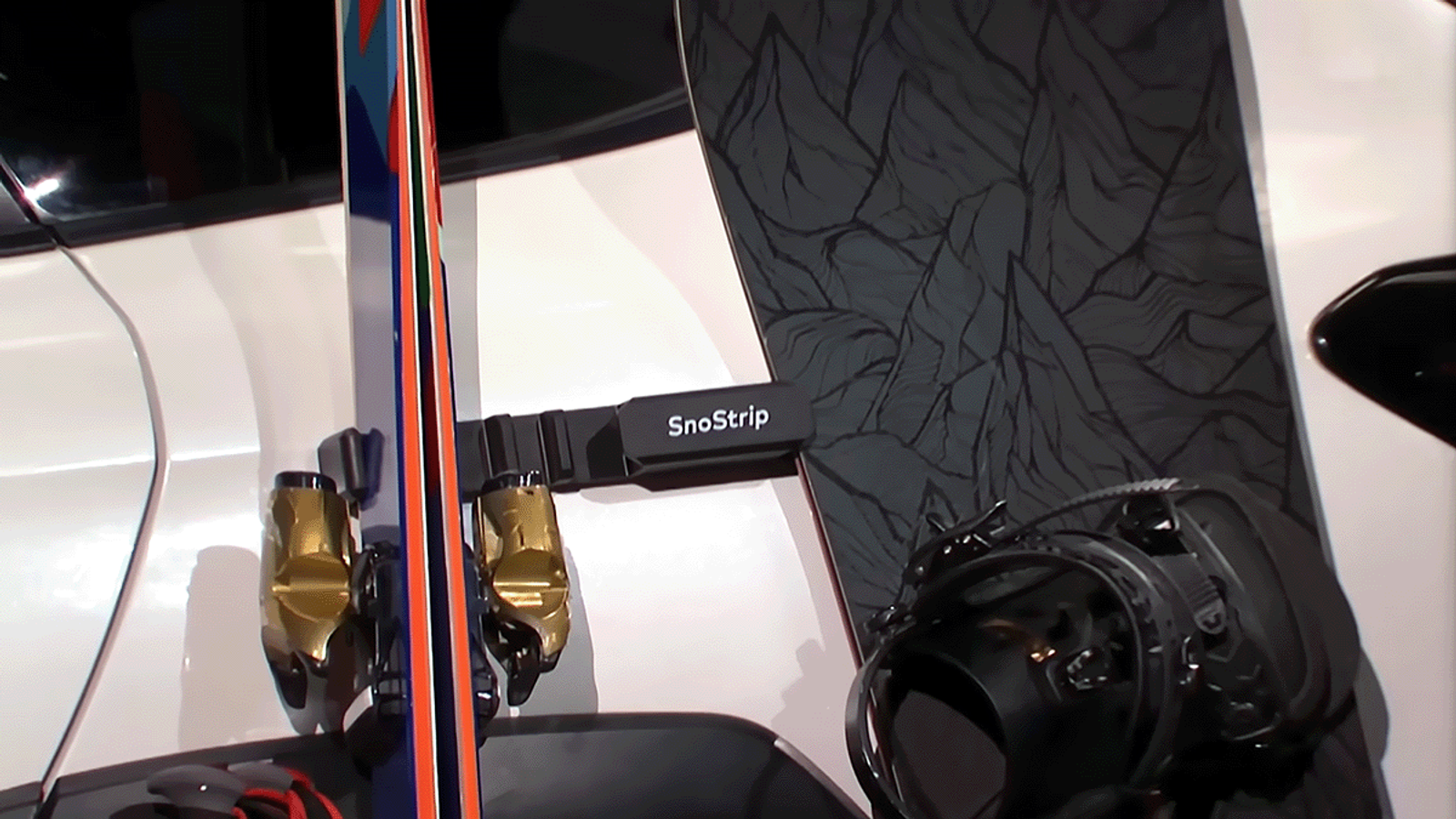 Customer image showing RigStrips' SnoStrip in use on a car.