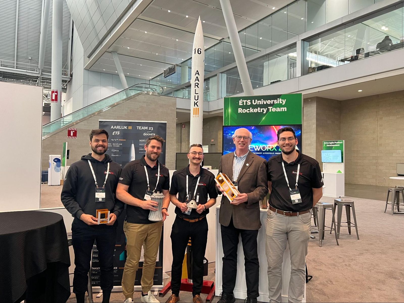 Rocket club members stand with Jon Hirschtick