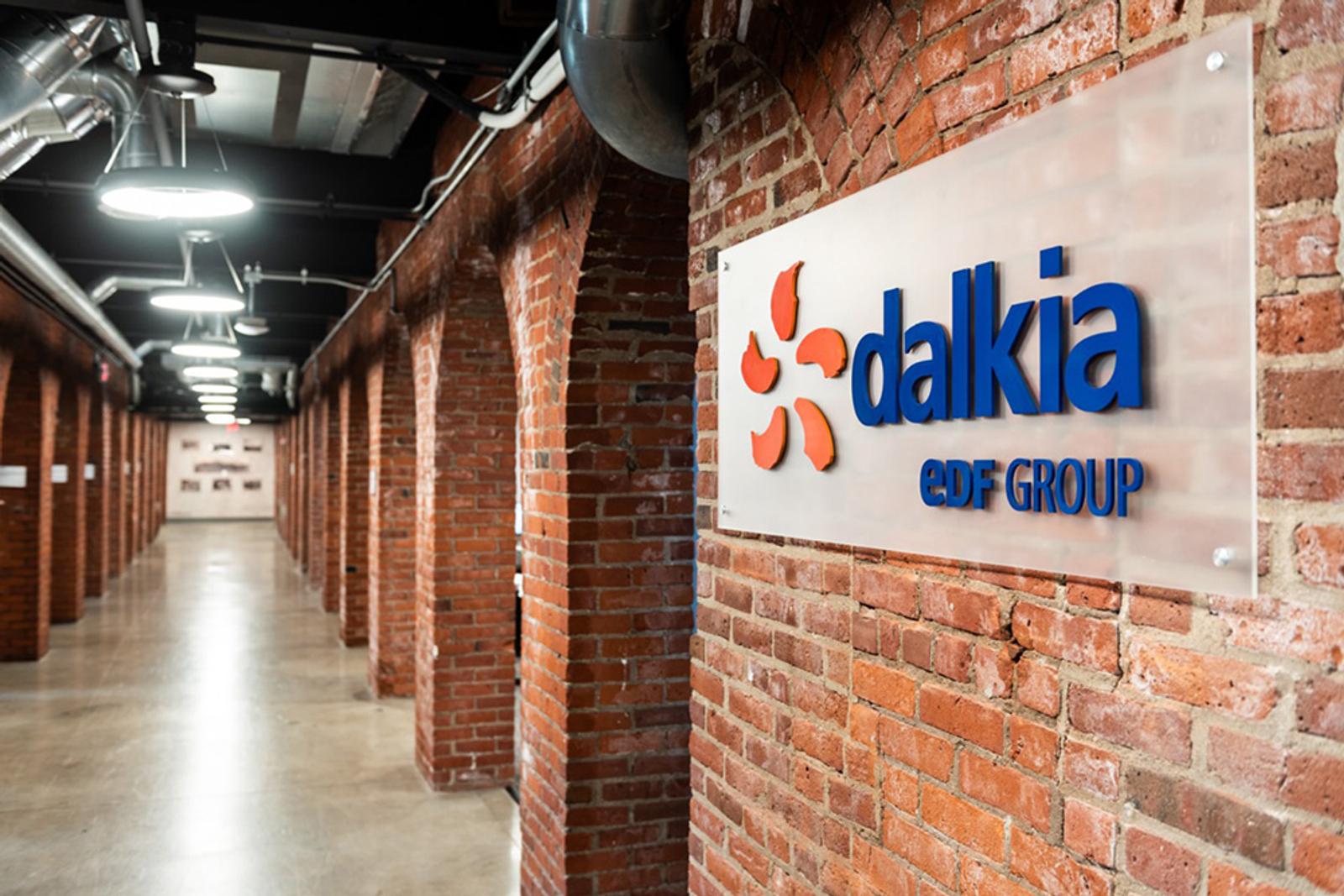 Dalkia logo on sign on brick wall