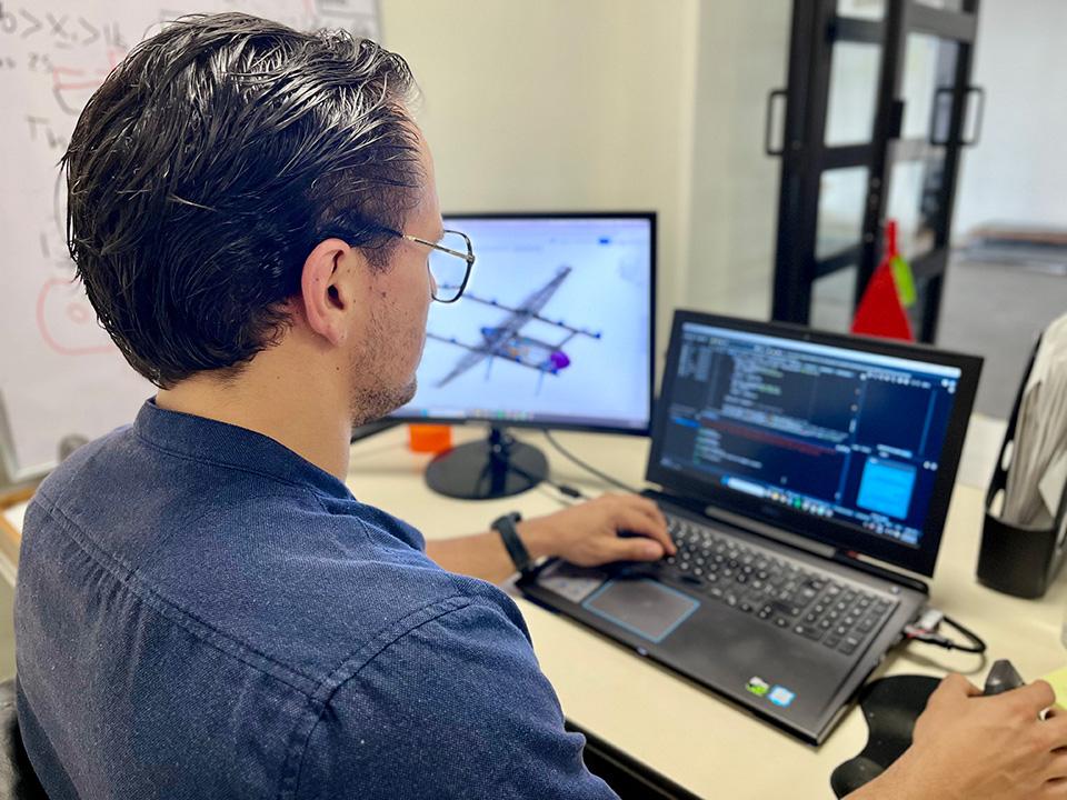 An engineer CADding an aircraft