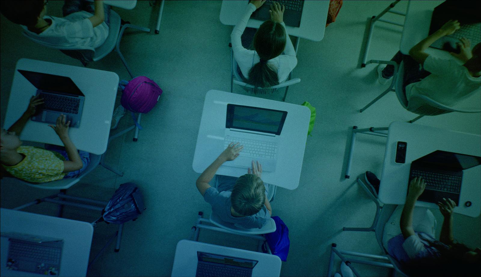 Stock image with a stylized overlay showing an overhead look at a classroom.