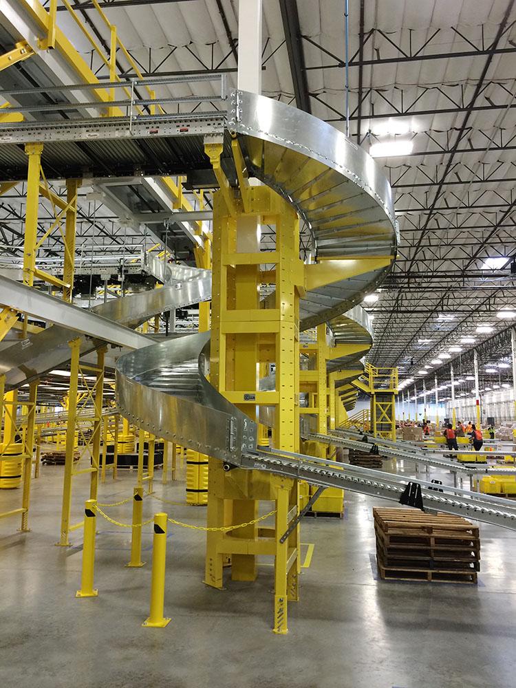 AEInc patented spiral chute in warehouse