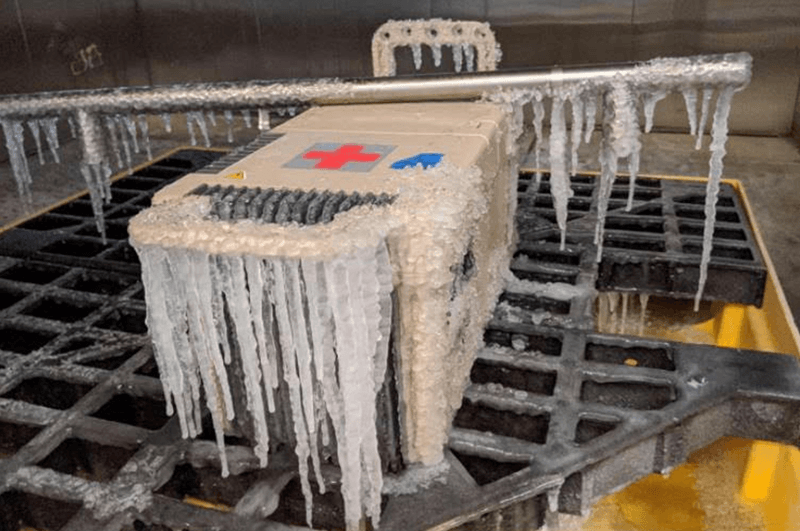 test of Delta Development's Portable Medical Refrigerator in ice