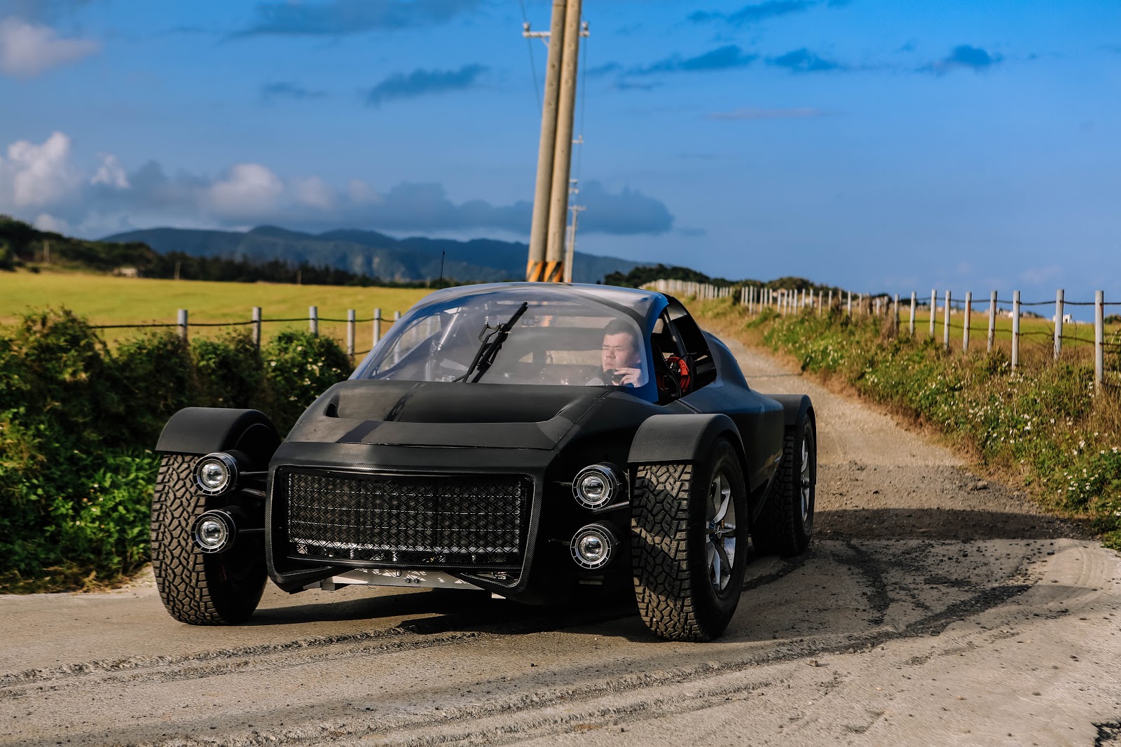 Photo of a prototype XING Mobility supercar used to test the company's electric motors and batteries. XING Mobility uses Onshape's real-time data management to prevent version control problems with their designs.